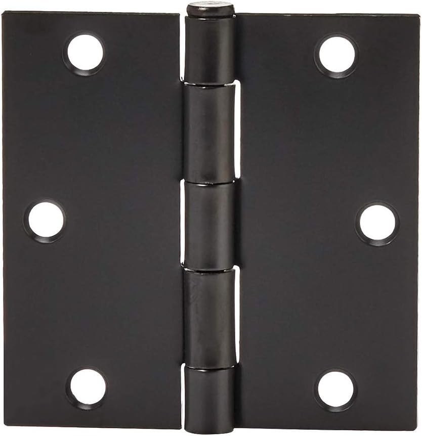 Amazon Basics door hinges installed on a wooden door